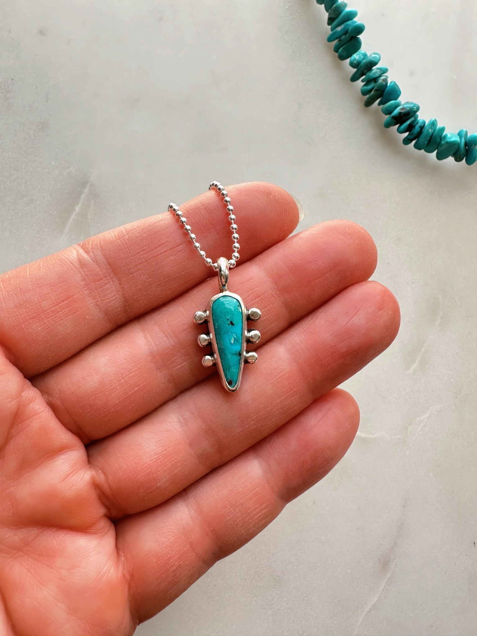 TURQUOISE SHIELD CHARM - NO. 1